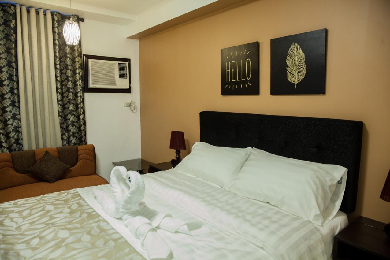 Melbourne Suites Makati City Buitenkant foto